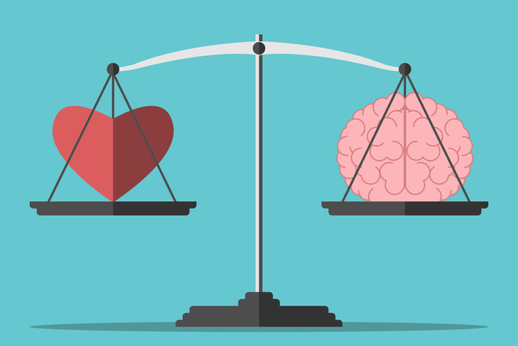 Ilustração de uma balança com um coração e um cérebro 