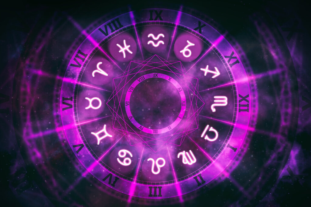Círculo roxo com os 12 signos do zodíaco no fundo preto