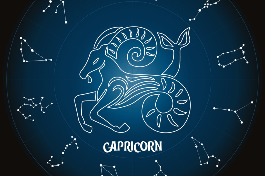 Símbolo do signo de Capricórnio e constelações ao lado no fundo azul