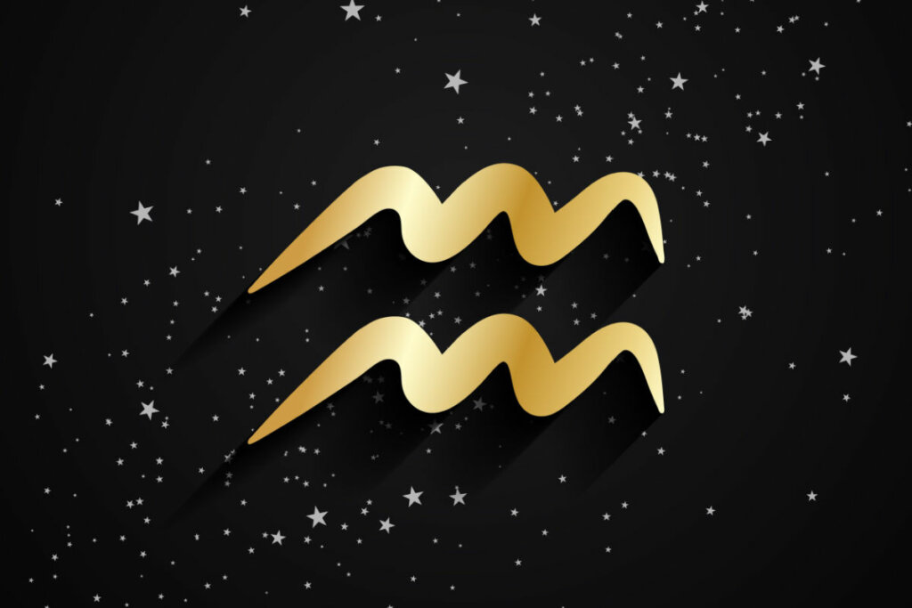Ilustração dourada do símbolo de Aquário em fundo preto com estrelas