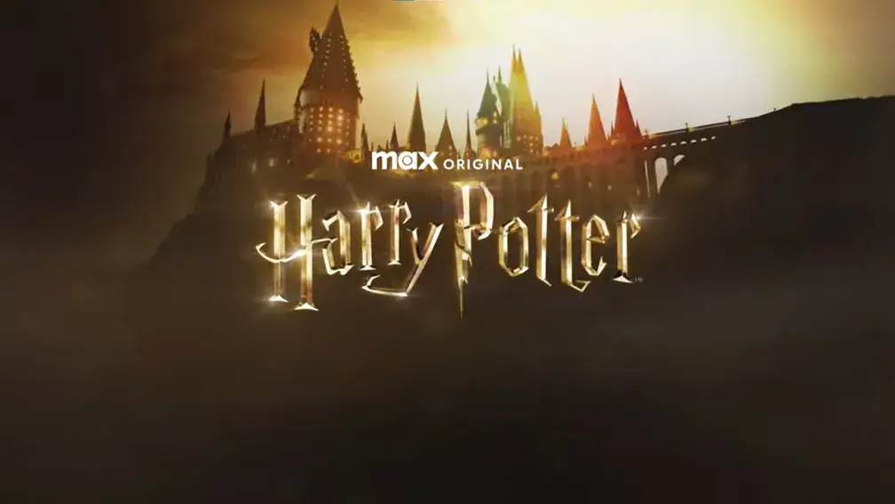 Imagem de teaser da nova série do Harry Potter. Um grande castelo - a escola de magia - com nome do bruxo em dourado.
