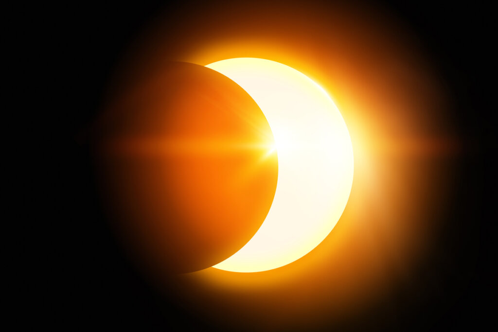 Imagem de um eclipse, em que um planeta cobre o sol