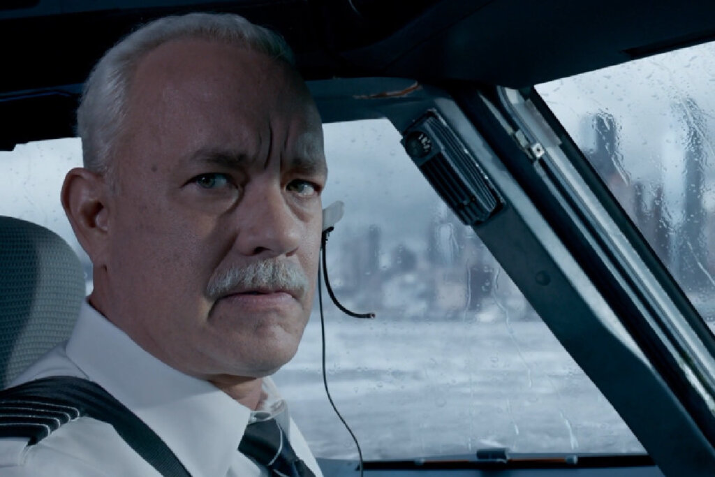 Reprodução de Tom Hanks em cabine de pilotagem 