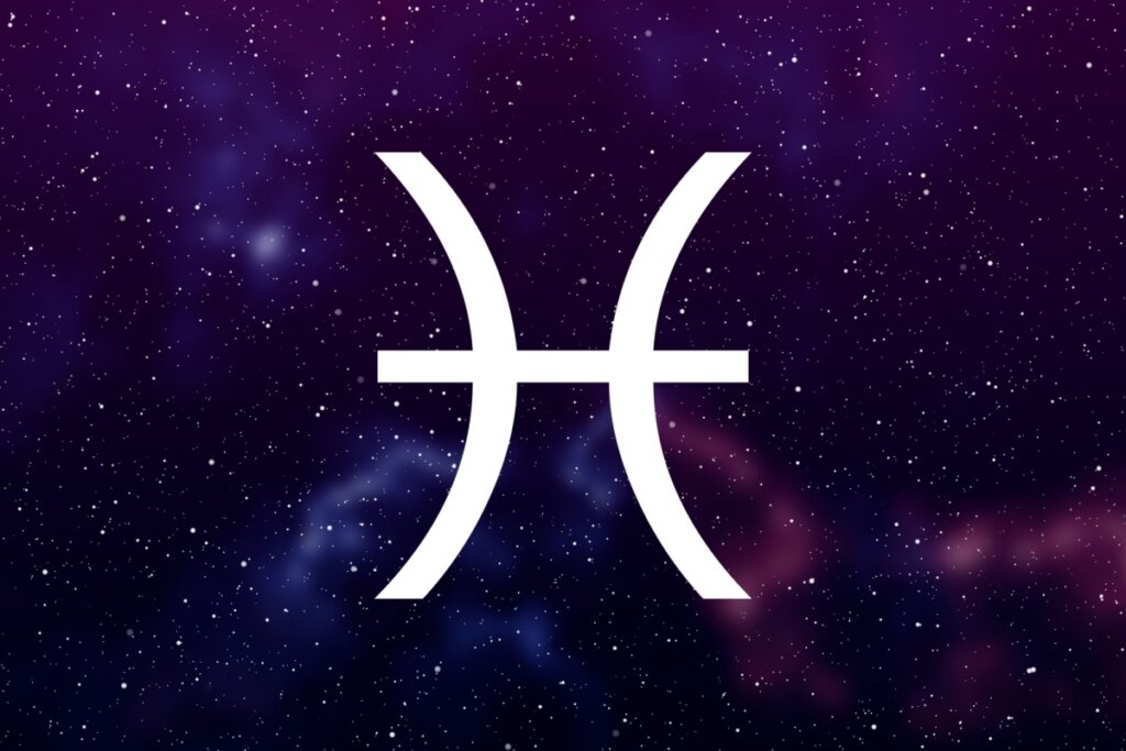 símbolo do signo de peixes em fundo com galáxia roxo