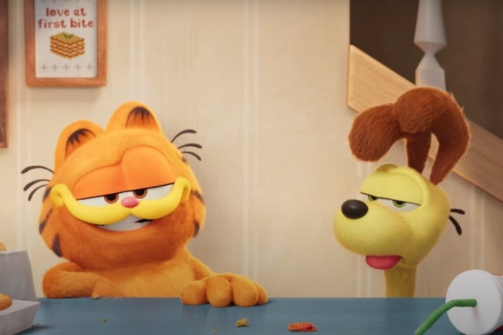 Cena do filme "Garfield: Fora de Casa"; gato e cachorro juntos