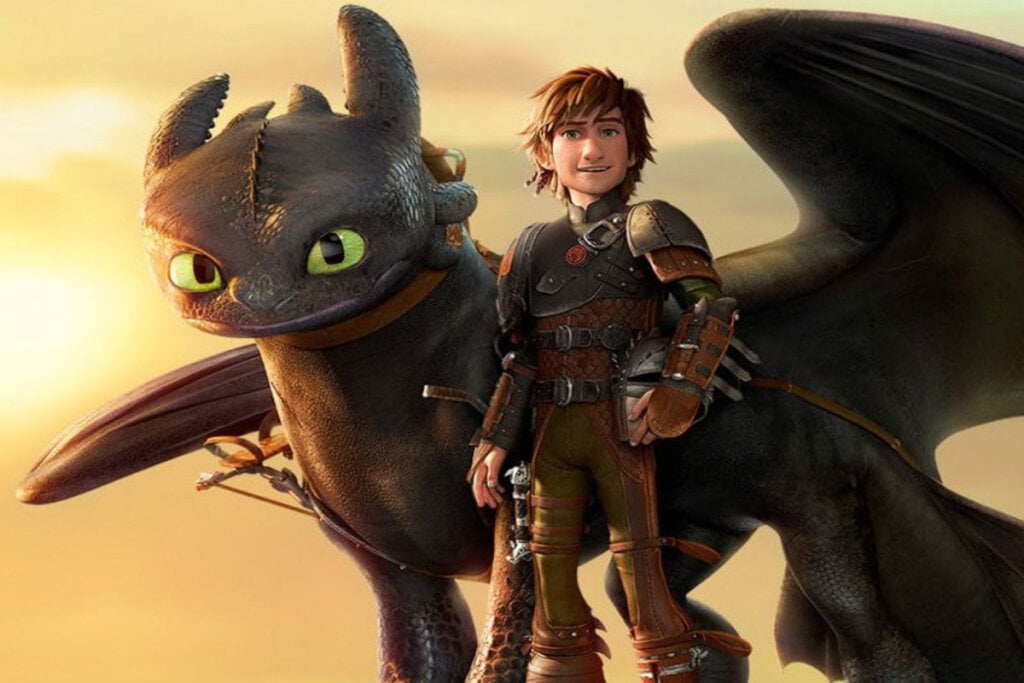 Cena do filme "Como Treinar o Seu Dragão"; menino e dragão juntos