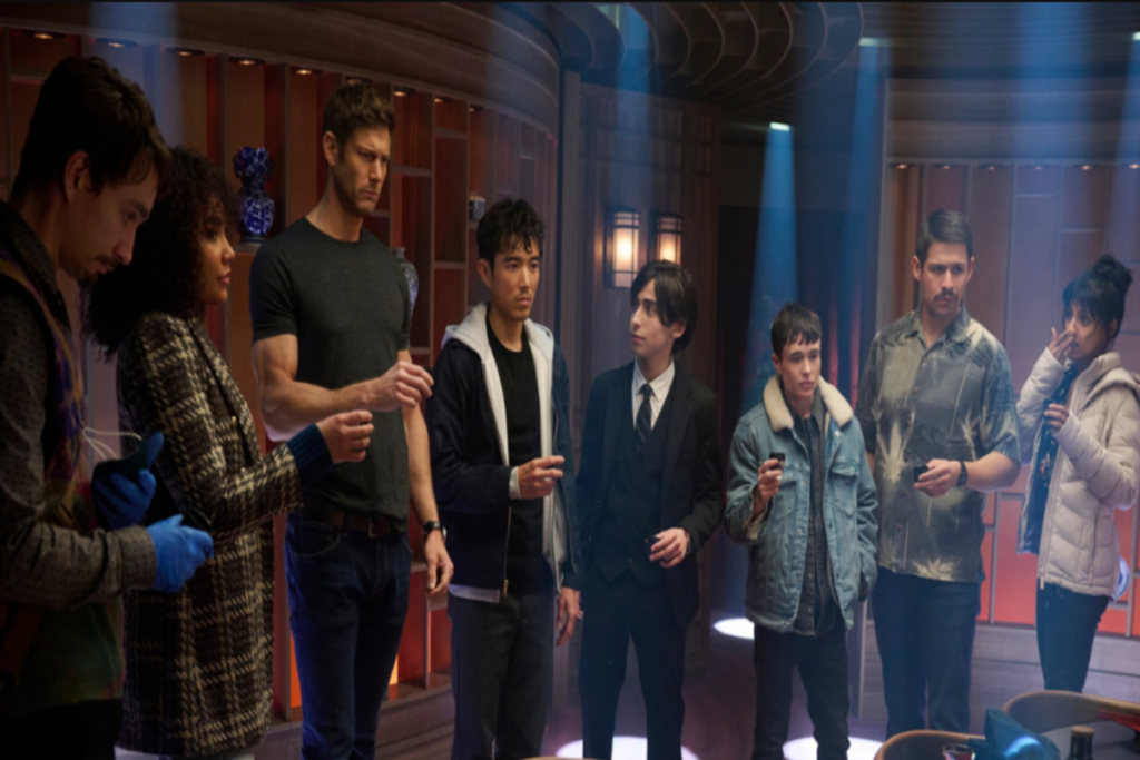 Personagens da série The Umbrella Academy reunidos em uma sala 