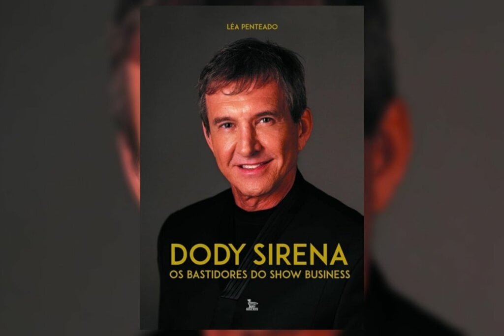 Capa do livro "Dody Sirena – Os Bastidores do Show Business" com a foto do Doddy vestindo uma blusa preta na capa 