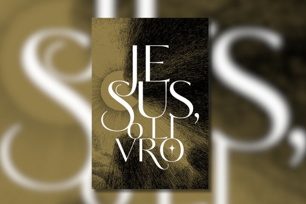 Capa da Bíblia Jesus, o Livro, com o nome do livro escrito em grandes letras brancas e fundo desfocado em preto e bege 