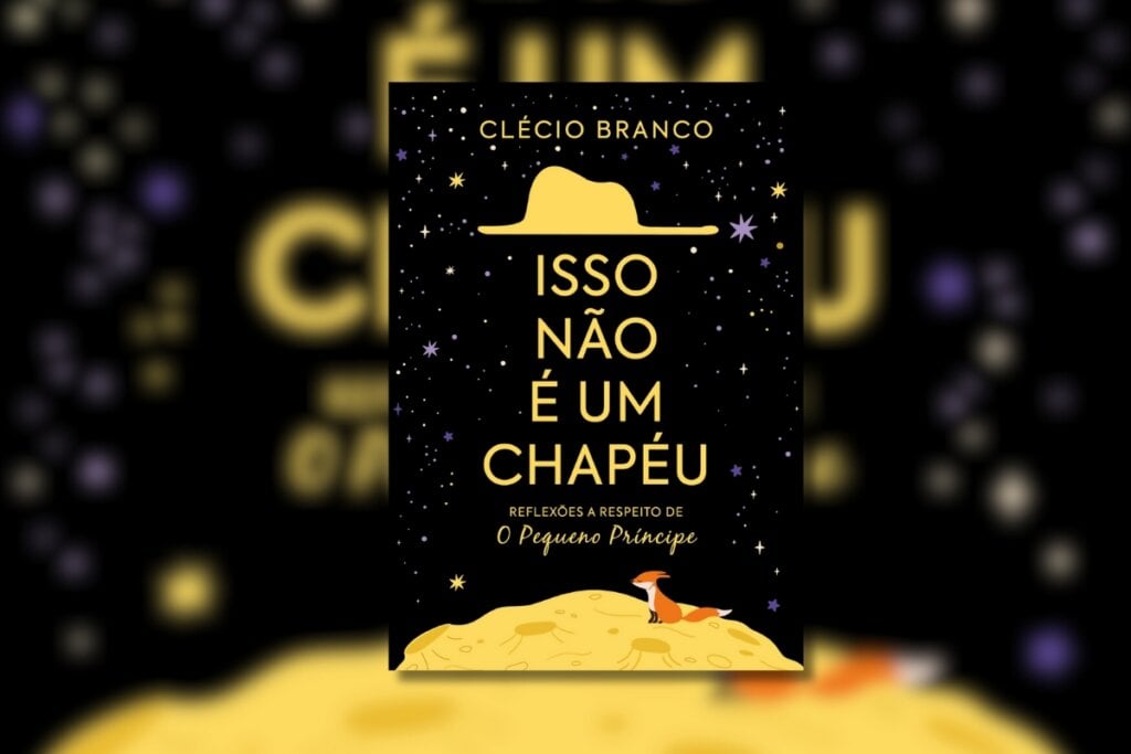 Ilustração de um chapéu dourado em um céu estrelado com uma raposa no topo de um planeta abaixo dele na capa do livro 