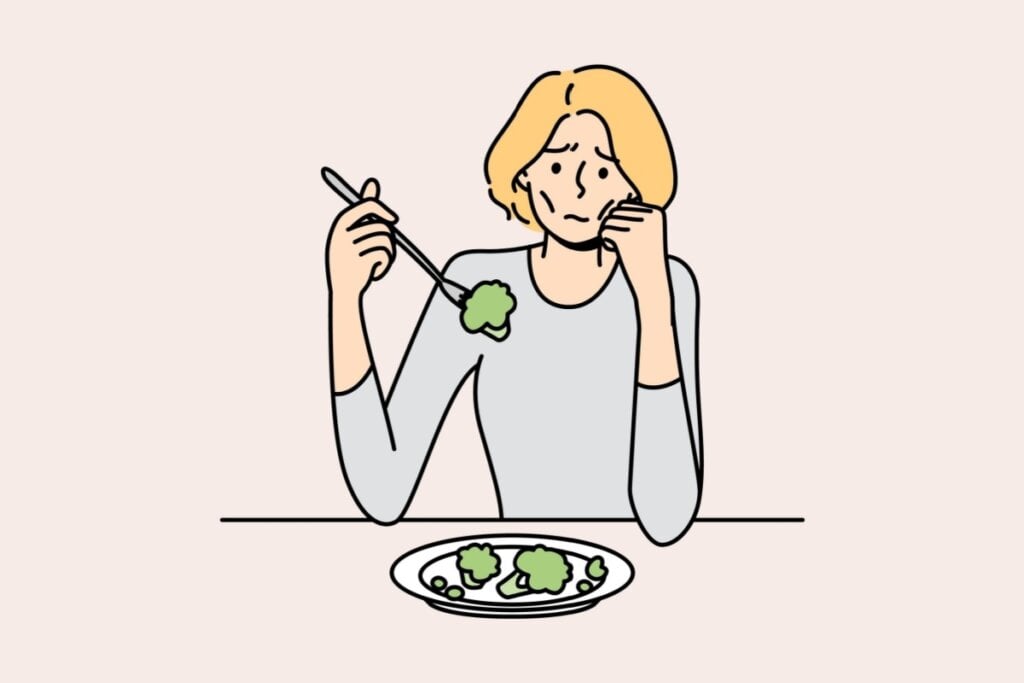 Na anorexia nervosa há uma restrição voluntária a se alimentar (Imagem: Vectorium | Shutterstock)